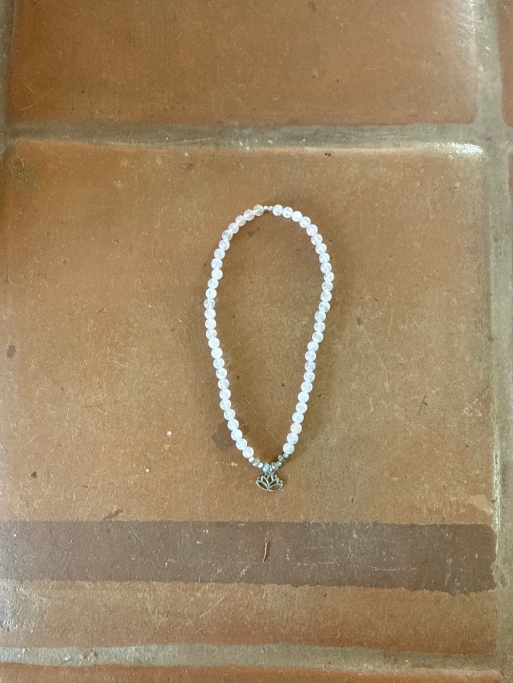 light pink lotus necklace